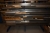 Pallet Racking, one-sided, 10 shelves, length approx. 6 meters with content: Various metal pipes, rods, profiles, etc. + pallet under rack with content