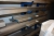 Pallet Racking, one-sided, length approx. 6 meter, 10 shelves. Content, various aluminum + pallet of goods on the floor by the rack, aluminum