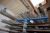 Double-sided cantilever racking, length 6 meters, 14 shelves with content: aluminum, stainless steel, swivel plastic, etc. + goods on the floor next to lot # 185