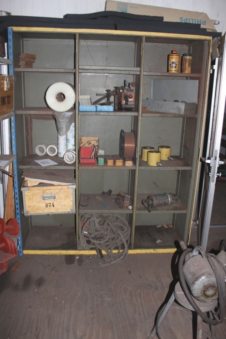 Rack containing various pistons + welding rods, etc.