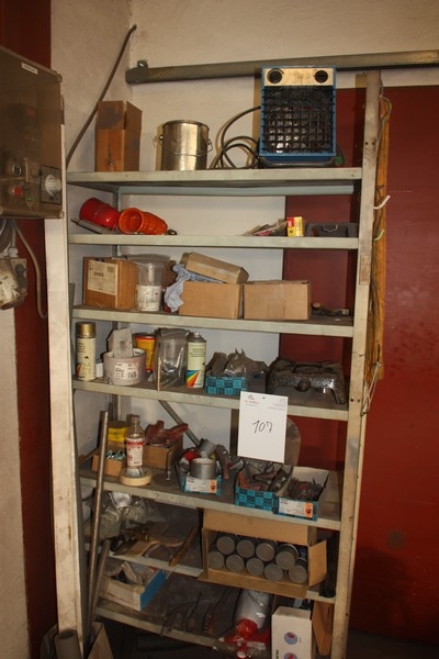 Steel Shelving with content including fan heater + aluminum spray
