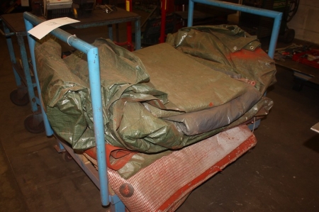 Trolley containing tarpaulins