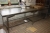Rustfri stål bord med bagkant, ca. længde: 3000 x dybde 900 mm. Uden indhold