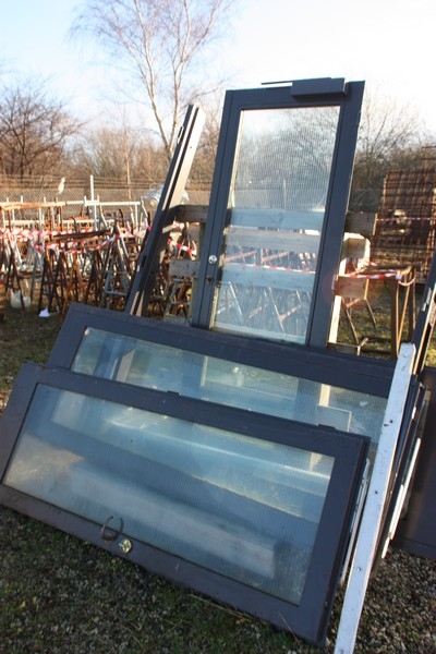 Lot used doors on stand