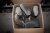 3 kasser med indhold: arbejdshjelme, tomme ringbind + gummistøvler + sikkerhedssko