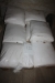About 1000 kg. road salt in 25 kg. bags. Stock Photo
