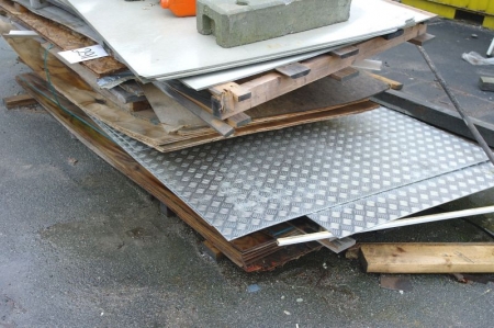 Checker plate covers + wood panel + asbestos cement, etc.
