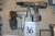 Air nailer + cordless nail gun without charger + miscellaneous items on shelf