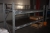 2 pallet racking with truck guards (hanging racks not included) + rack on wheels