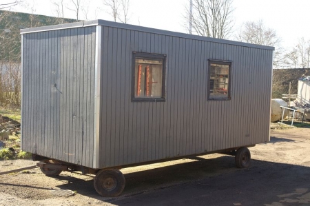 Construction site trailer, approx. 6000 x 2500 x 2500 mm with 2 windows + door designed with lunch room with tables + chairs + lockers