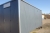 Construction site trailer, approx. 6000 x 2500 x 2500 mm with 2 windows + door designed with lunch room with tables + chairs + lockers