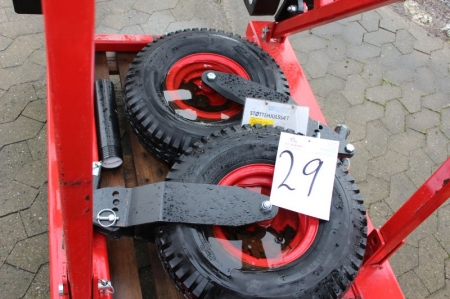 Igland stabilizer wheel sets for motor graders, adjustable