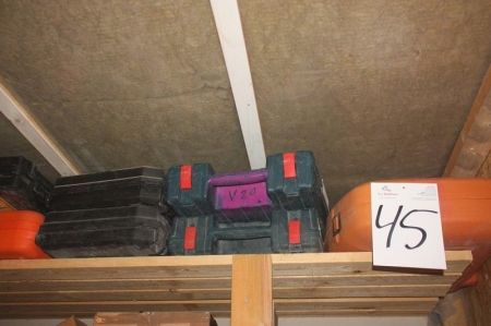Lot of empty tool boxes on top of wooden rack and contents of 1 shelf in 3 section wooden rack