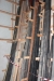 Contents in rack. Various boards, painted boards, impregnated profile boards, laminated boards, lists, etc.