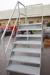 Galvanized stair with landing and railing. Height of landing: approx. 1.5 feet