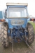 Tractor, Leyland 255 Hours: 6046. Runs OK. Missing side cover plates on motor. Tires are worn. Lights serviced.