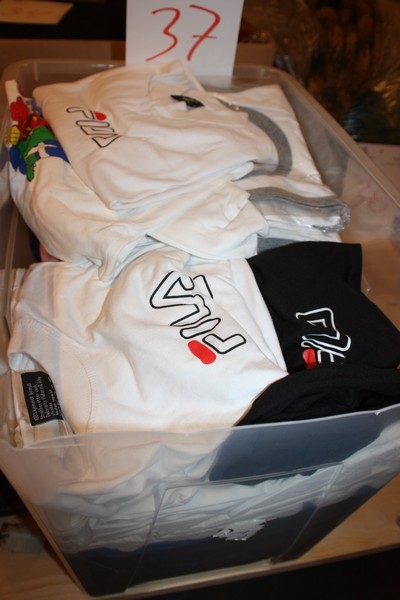 Box with T-shirts, Fila. For sale by private individual. VAT applicable on Buyers Premium only
