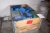 Pallet with various assortment boxes, plastic and steel