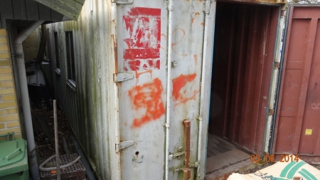 Shipping container 40. "Workshop Container with 4 windows and 1 door. Miscellaneous current, ceiling lights and workbench. Lock bar. Collection only by prior agreement