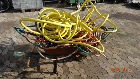 Wheelbarrow with assorted hoses, etc.