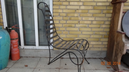 Wrought iron chair. Retro provence style. Detailed spine and design. Height approx. 107 cm and width 58 cm.