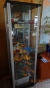 Glass cabinet (less content). Width 55 cm. Depth 39 cm and height 182 cm. Beautiful