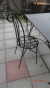 Table with 4 chairs. Wrought iron table and chairs. Retro provence style. Table approx. 168x77 cm. Height approx. 73 cm. Highly detailed and beautifully done. In need of TLC