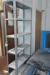 2 span steel rack with content + trolley with paper + residue in the corner + washing etc.