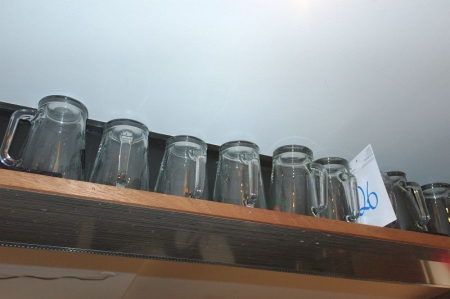 Lot jugs on shelf