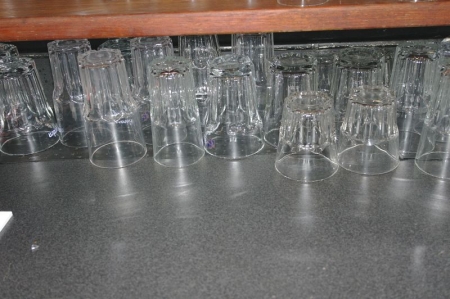 Lot glasses on disk + assorted bottles of wine + spirits