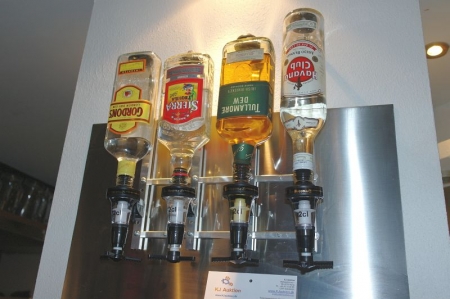 Spirits bottle holder on wall with 2 cl dispenser