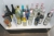 Contents of shelf: various spirits + liqueurs, etc.