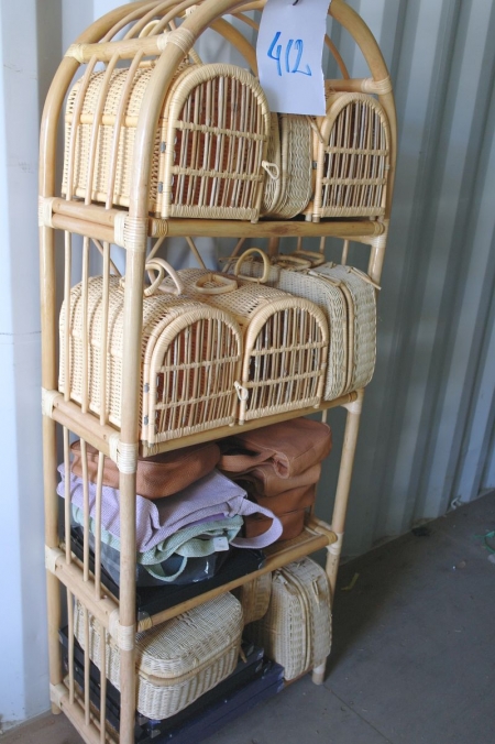 Baskets Shelf containing various baskets + bags etc.