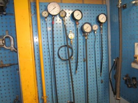 Pressure gauges and hoses, etc. on one panel. Panel included