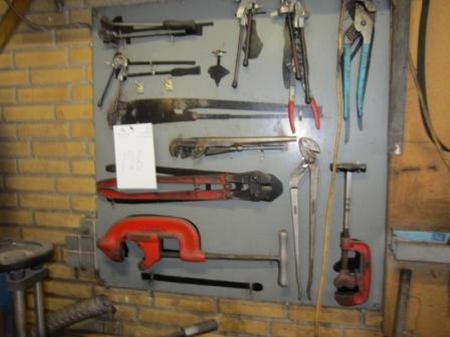 Pipework Tools bolt cutters and various. Hand tools on wall bracket