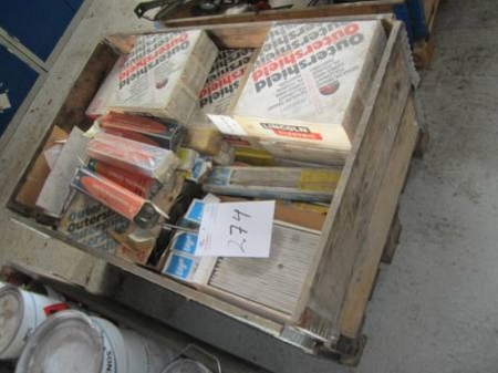 Pallet lot of welding wire, approx. 20 rolls, and misc. electrodes