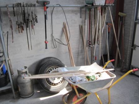 Buckets, brushes, clamps, wheelbarrow, 2 car wheels mm in the corner