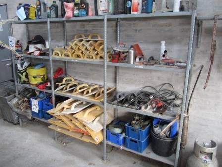 Polishes boards, masonry tools, straps, chemistry and the like in 3 span stock rack