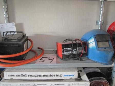 Charger, battery and welding helmet