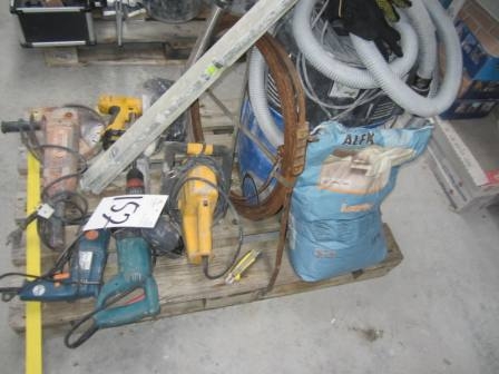 Pallet with DeWalt aerated concrete saw, hammer, drill, screwdriver, large angle grinder, industrial vacuum cleaner, cleaning tape, etc.