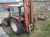 4WD tractor, Universal 453DT, 2,229 hours, with front weight and construction lift, MTT Combi, pallet forks and older person basket lift. Year 1998. 8 meters