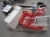 Pallet with new hand saws, paint bucket, toilet parts, etc.