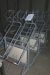 3 pcs. steel racks on wheels with slanted shelves