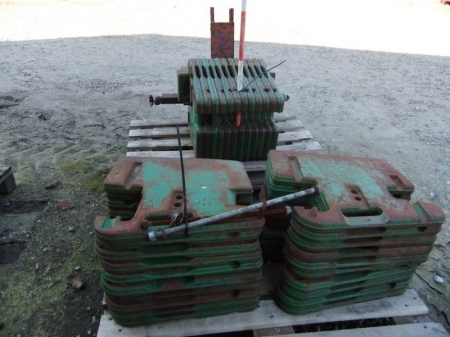 2 pallets with 3 sets of weight blocks, one with mounting brackets