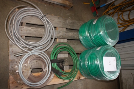 2 rolls of reinforced water hose, unused + assorted air hoses