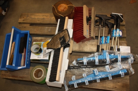 Pallet with various brooms, squeegees, barrier tapes, etc.