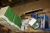 Pallet including 5 x mailboxes, white, metal, unused + broom, string, brushes, etc.