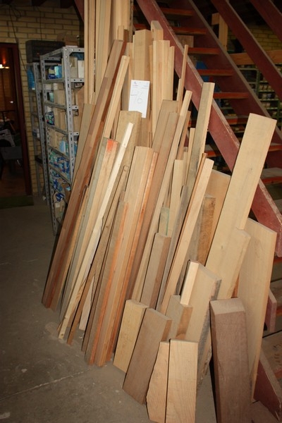 Lot mixed wood along the staircase, including oak and exotic