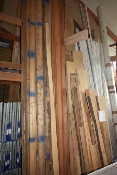 Planks etc. In rack as depicted, including hardwood (oak, mahogany)