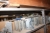 Content on 4 span Steel Shelving, including metal connector plates, plumbing fittings, downspouts, gutter brackets (Zinck). Lot 171 not included